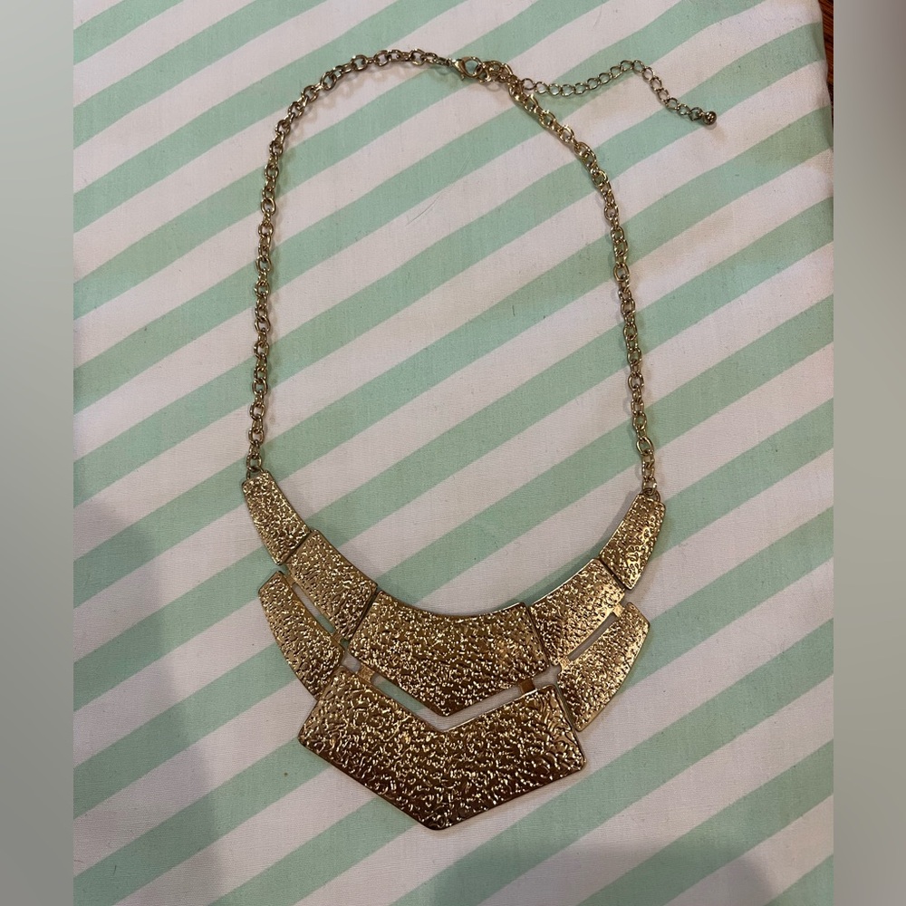 Hammered gold statement necklace geometric design